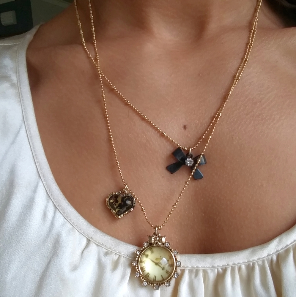 BetsyJohnson Gold clock,Black bow, heart necklace